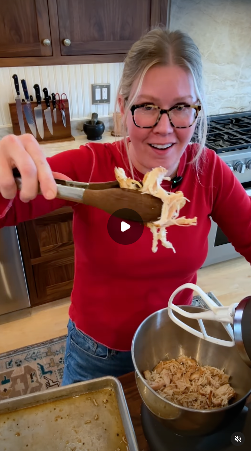 Ellie shredding chicken